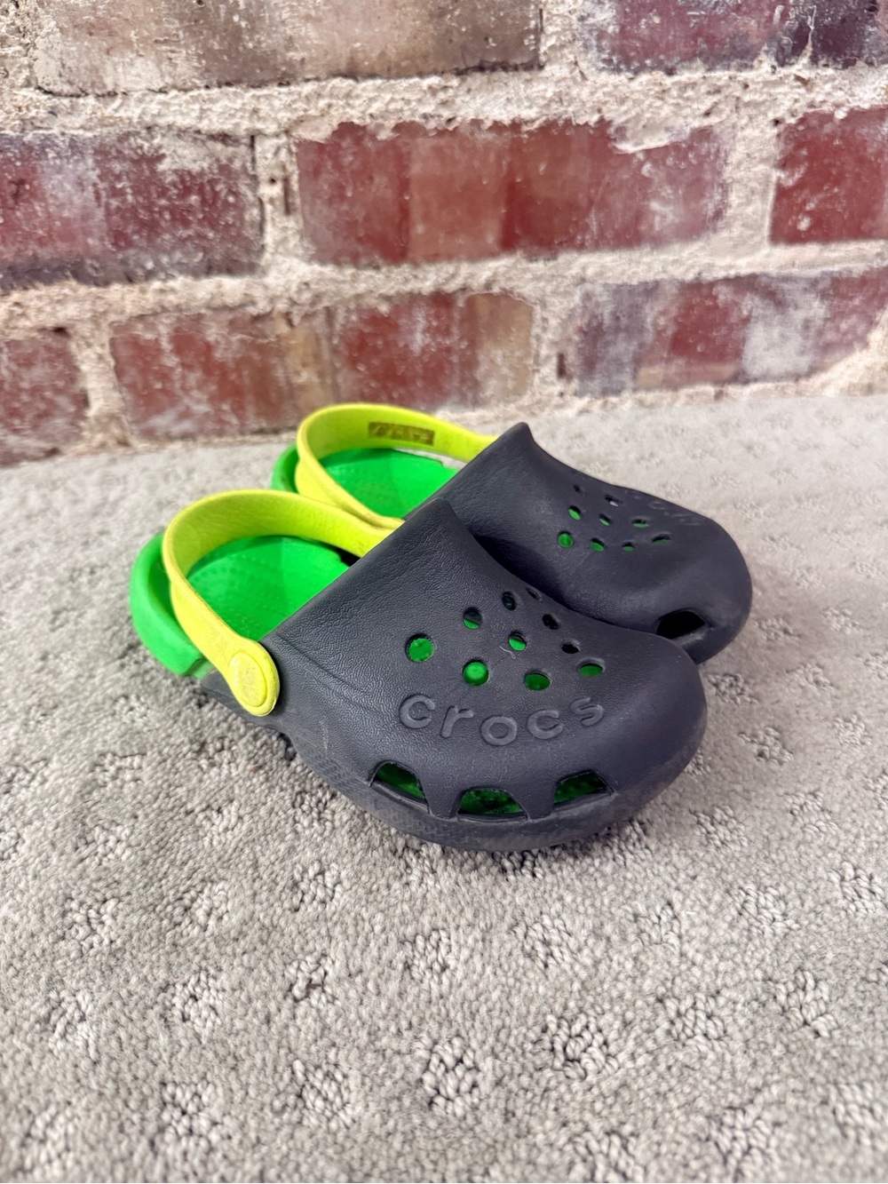 CROCS Kids Black Clog with Lime Green Footbed and Yellow Heel Strap
